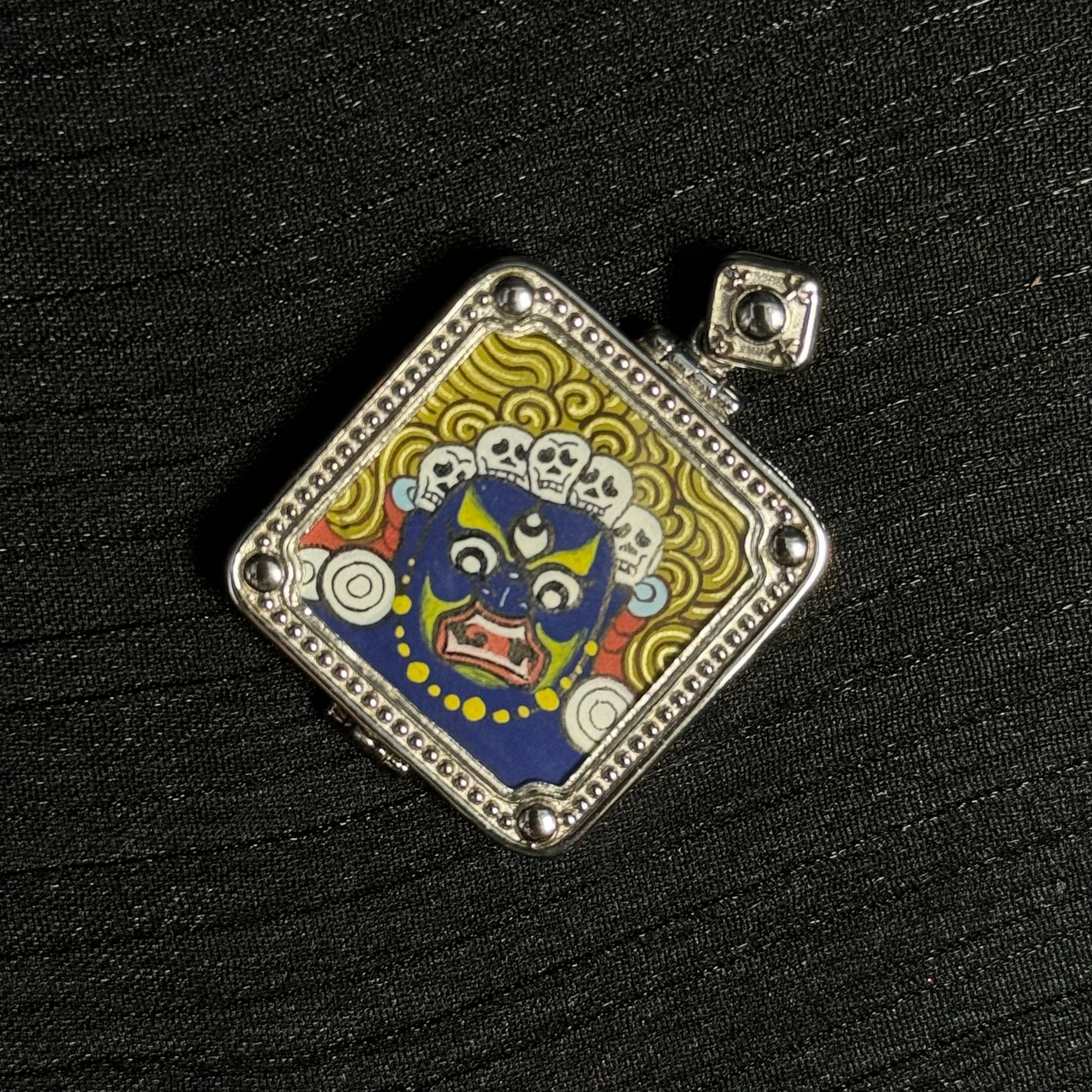 Close-up detail of the Tibet Six-Armed Mahakala Thangka painting showing natural mineral pigments, showcasing the masterful artistry of Tibetan lineage painters.

