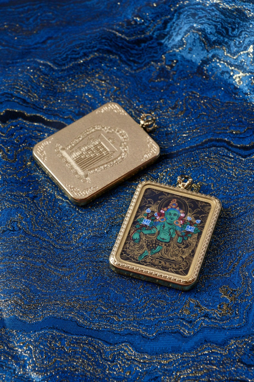 Tibetan thangka jewelry featuring Green Tara, inspired by traditional Tibetan Buddhist sacred art.