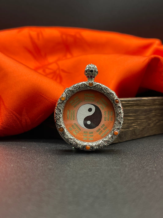  Detailed view of the matte copper casing for the Taiji Bagua pendant, symbolising balance and tradition in Chinese practice.

