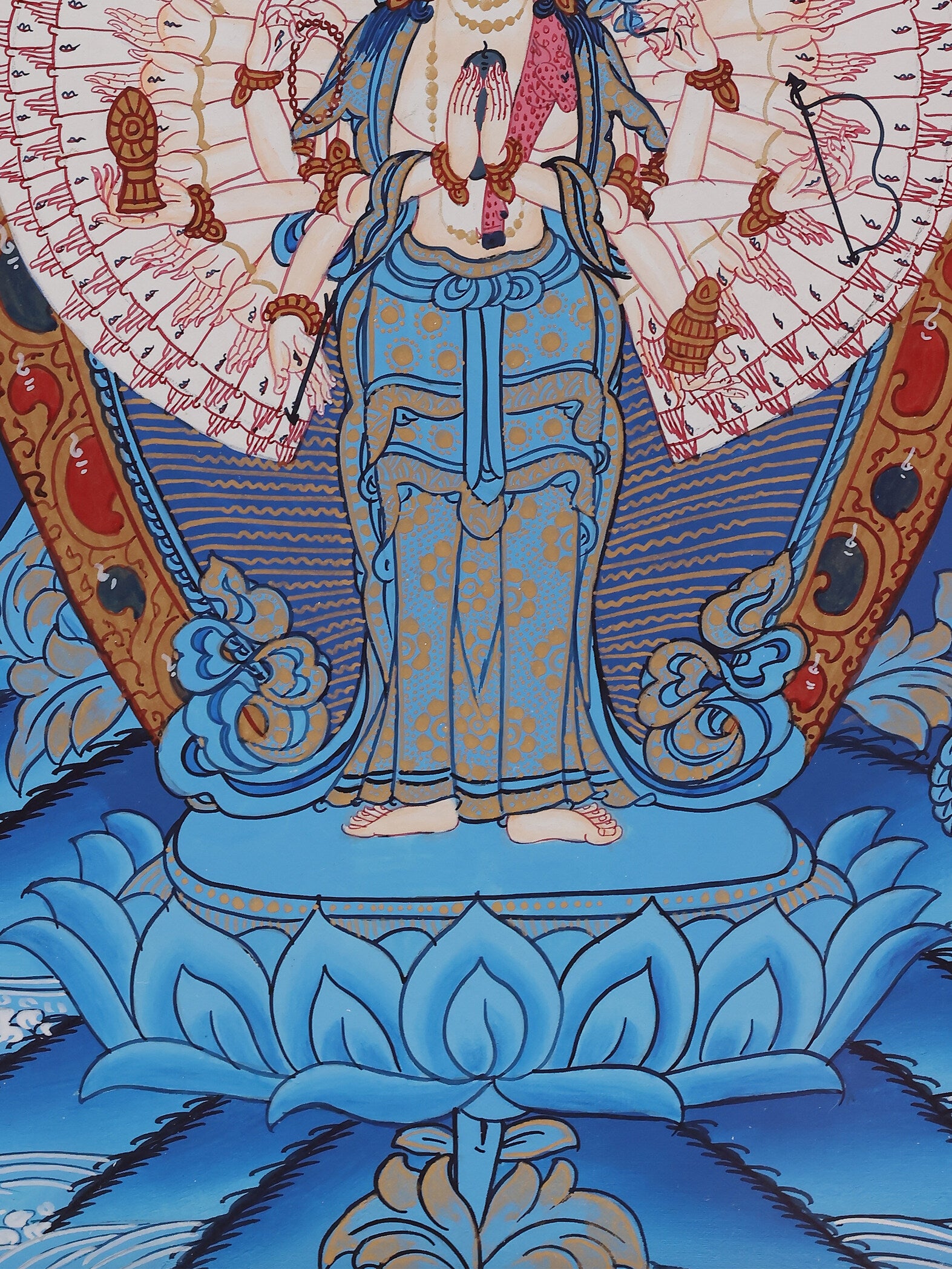 Detailed Tibetan Buddhist Thangka of Eleven-Faced Thousand-Hand Thousand-Eyed Avalokiteshvara, showing gold ornaments and radiant halo.