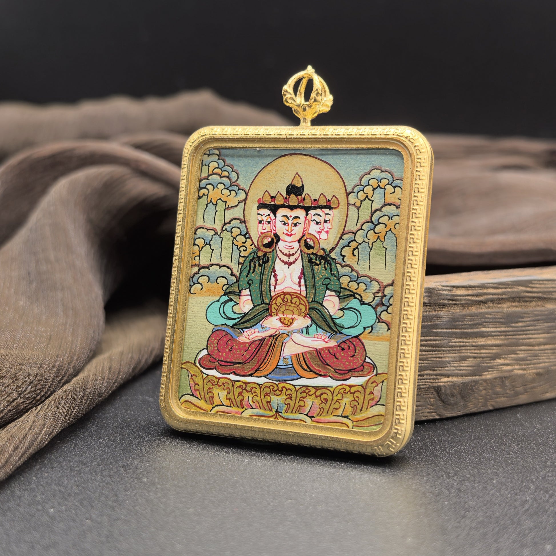  Hand-painted Nepal Vairocana (大日如来) Thangka pendant 4x5cm with titanium casing featuring the Buddha of Cosmic Illumination, representing wisdom and illumination in Buddhist tradition.

