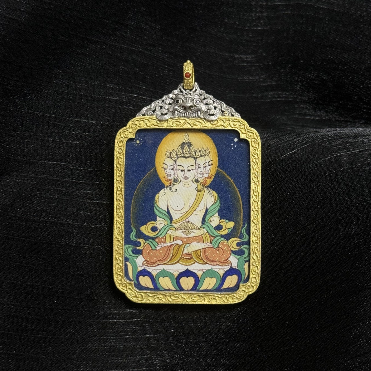Close-up detail of the Bold Vairochana Thangka painting showing intricate natural mineral pigment work and symbolic hand gestures, showcasing the artistry of Tibetan lineage painters.
