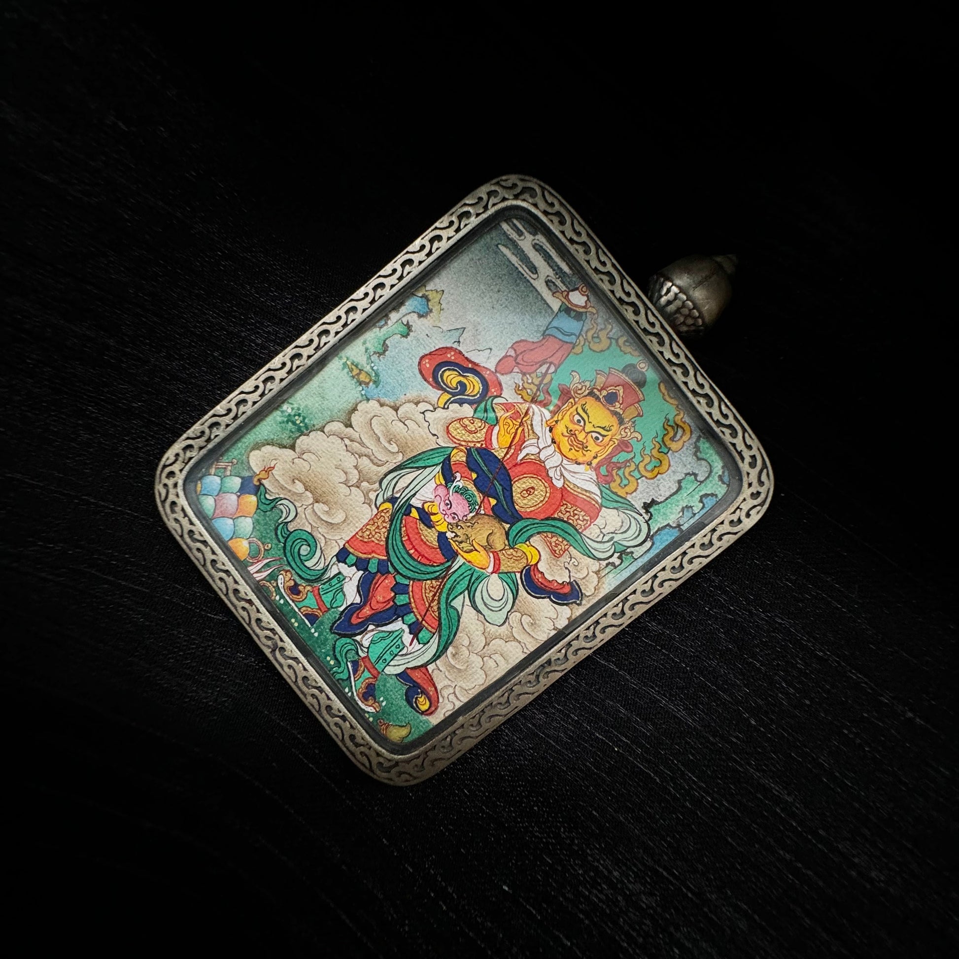 A 3.5x4.5cm hand-painted Rekong Cuiying series Vaishravana (Northern Guardian King) Thangka pendant featuring wealth and protection in Buddhist tradition.
