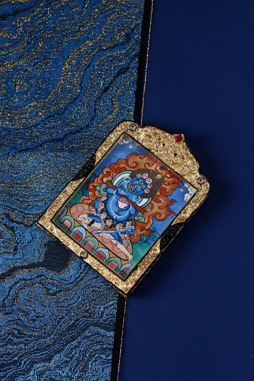 Baozhang Huzhu Vaishravana thangka jewelry representing a revered wealth guardian in Tibetan Buddhist culture.