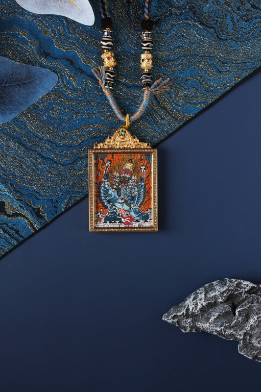  Detailed view of the titanium steel casing for the Vajrabhairava Thangka pendant, symbolizing protection and elegance in Tibetan Buddhist tradition.

