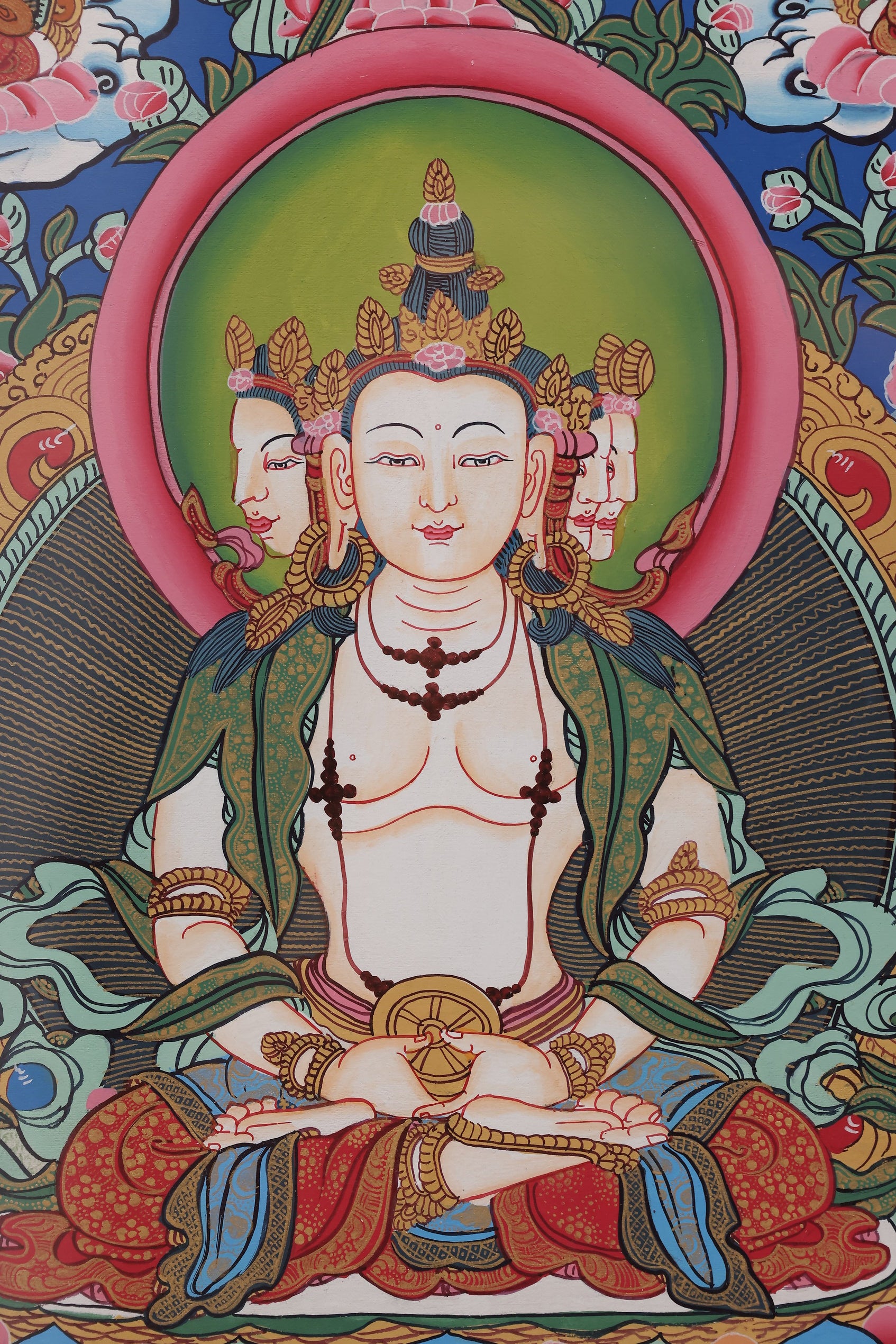 Attendant deities surrounding the central figure in the Vajradhatu Mandala, illustrating hierarchy and tantric symbolism.