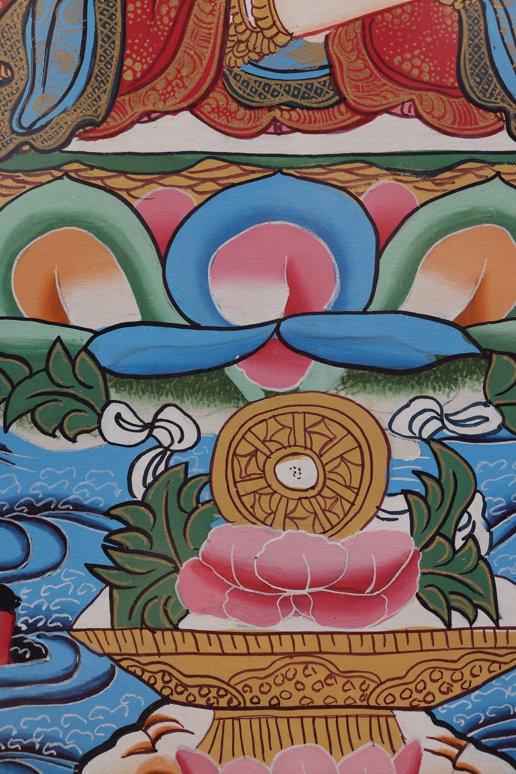 Wide view of the hand-painted Vajradhatu Mandala illustrating the spatial arrangement of deities and ritual elements.