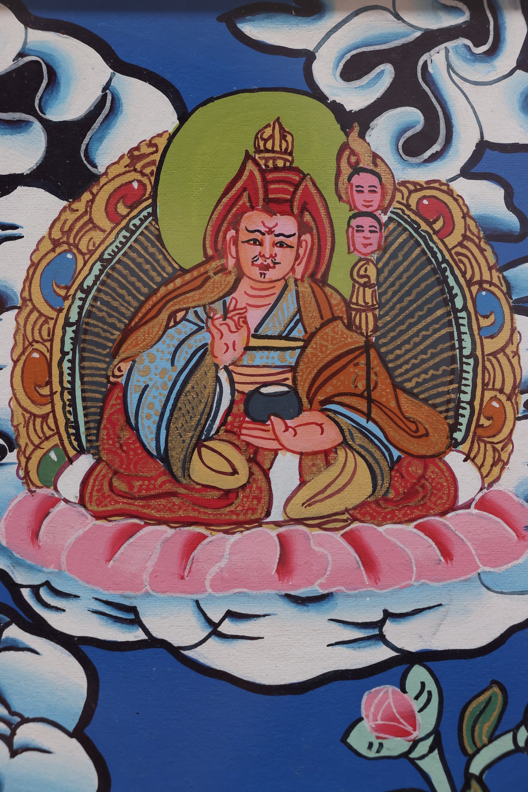 Close-up of guardian deities in the Vajradhatu Mandala highlighting their ritual attributes and vibrant colors.