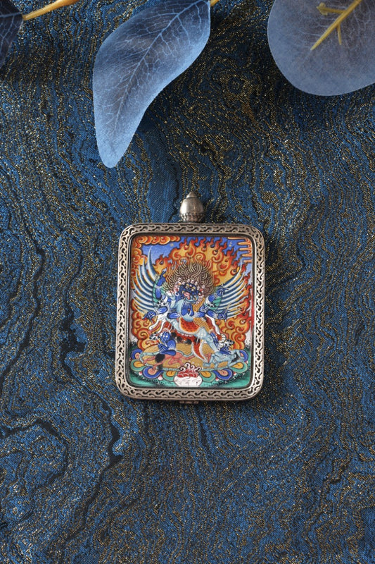 Thangka necklace portraying Vajrakila, the ritual Subduer Vajra, representing spiritual strength and tantric practice.