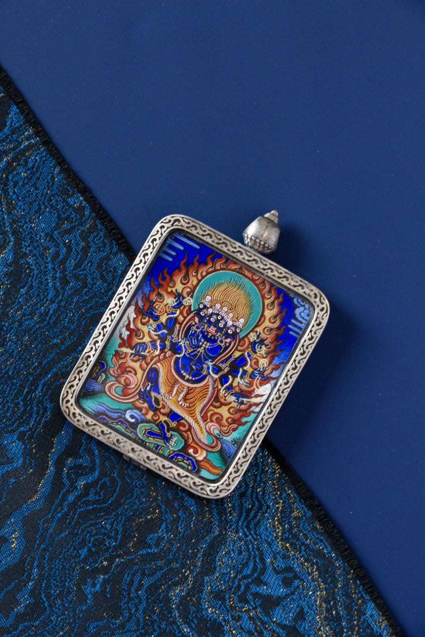Sacred Tibetan thangka pendant of Heruka, associated with Himalayan protection, fierce compassion, and spiritual purification.