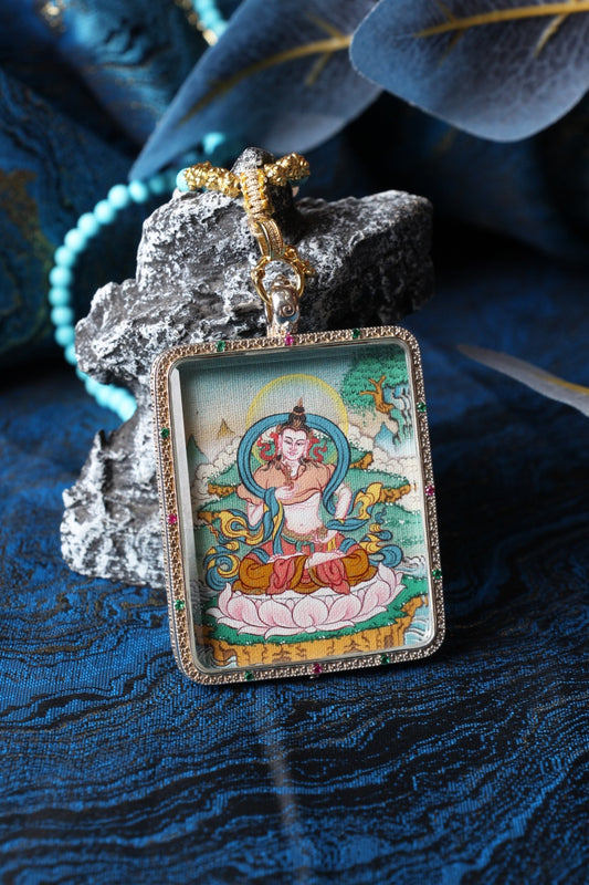 The Tibetan Buddhist Vajrasattva Thangka pendant displayed as a sacred amulet for karma purification, spiritual renewal, and meditation practice, embodying the pure light and compassionate purification of Tibetan Buddhist tradition.
