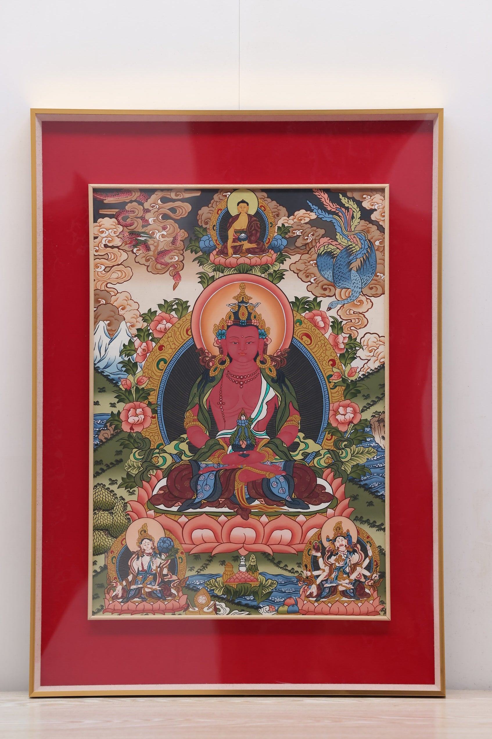 Longevity Buddha Thangka with guardian Bodhisattvas illustrating compassion and wisdom in Tibetan Buddhist art.