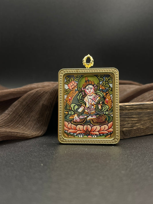  Detailed view of the titanium casing for the White Tara Thangka pendant, symbolising longevity and tradition in Buddhist practice.

