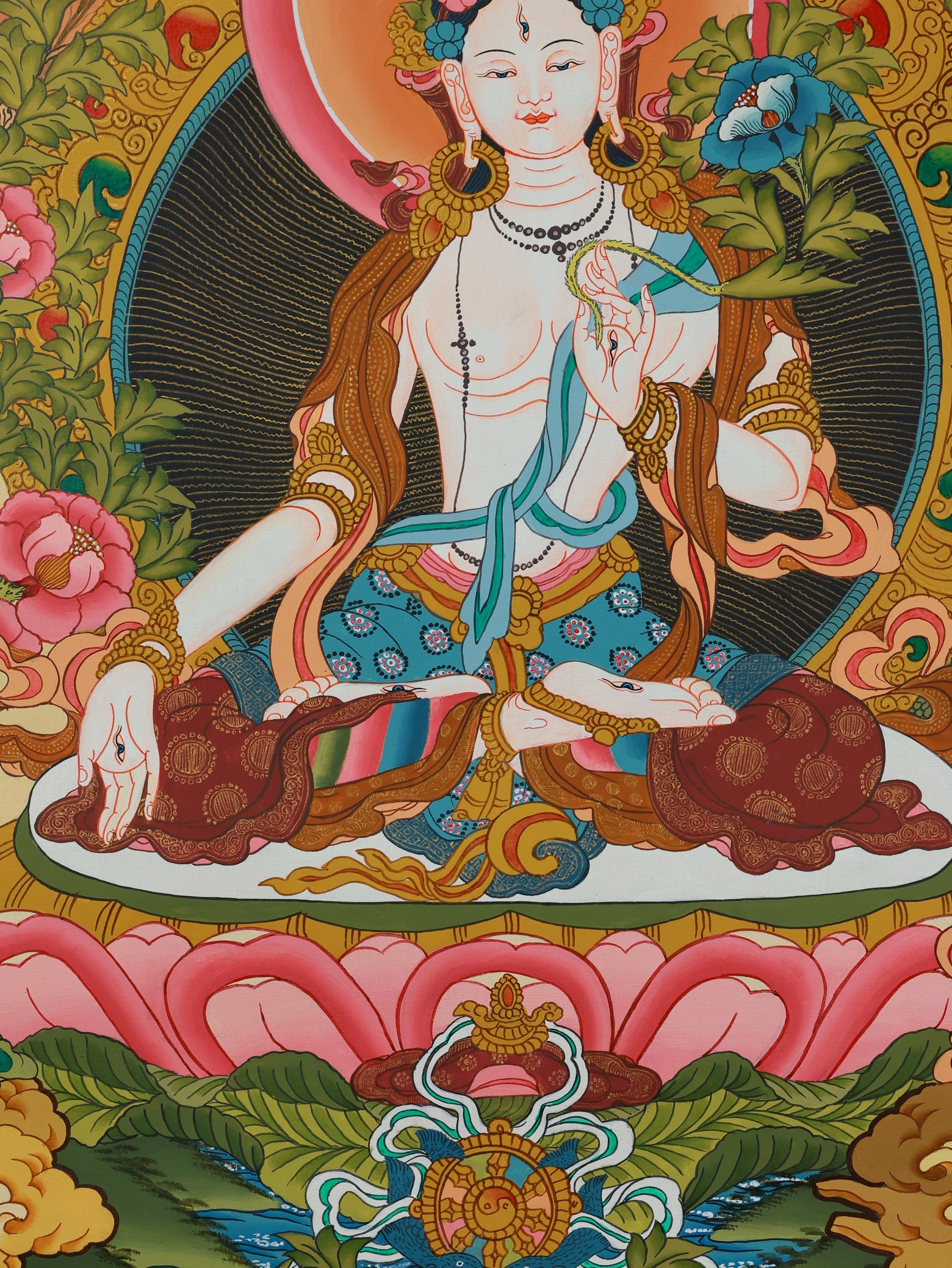Traditional Tibetan tantric White Tara thangka painted in vibrant colors with sacred Buddhist symbolism.