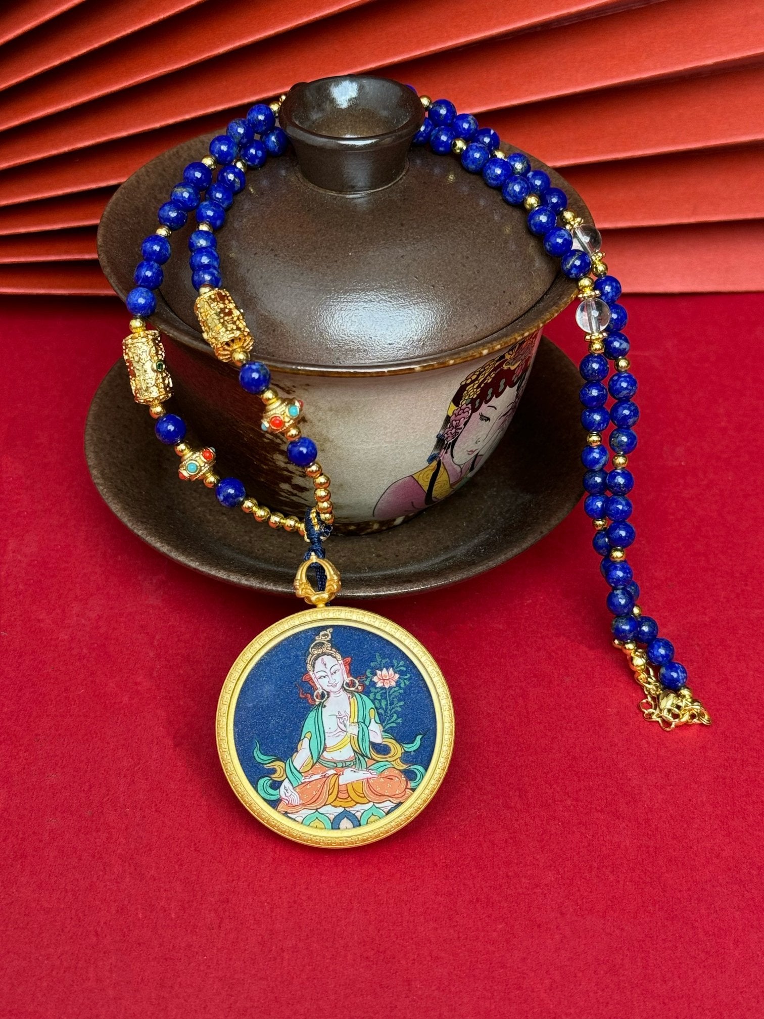  Hand-painted Tibet Bold White Tara (白度母) Thangka pendant 3.5cm with copper casing featuring the 威德 of rescuing from eight calamities, representing health, peace and longevity in Buddhist tradition.
