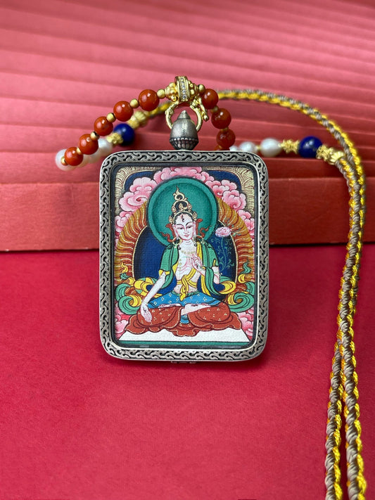 Hand-painted Tibet White Tara (白度母) Thangka pendant 3.5x4.5cm with copper casing featuring longevity and purity, representing pacify obstacles in Buddhist tradition.
