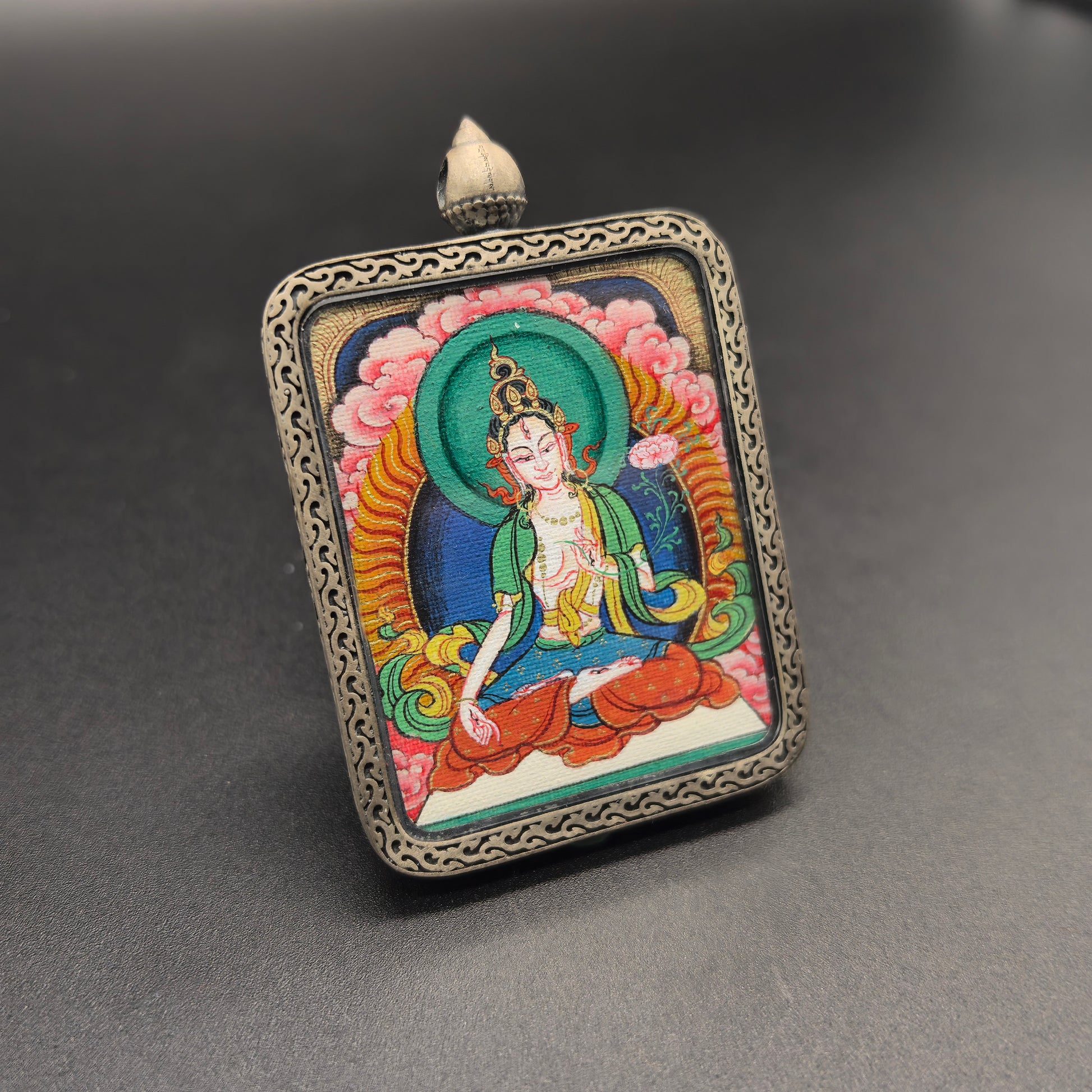 A 3.5x4.5cm hand-painted Tibet Red Cloud White Tara (白度母) Thangka pendant with 925 silver featuring the Tara of Increasing Life, representing longevity and wisdom in Buddhist tradition.
