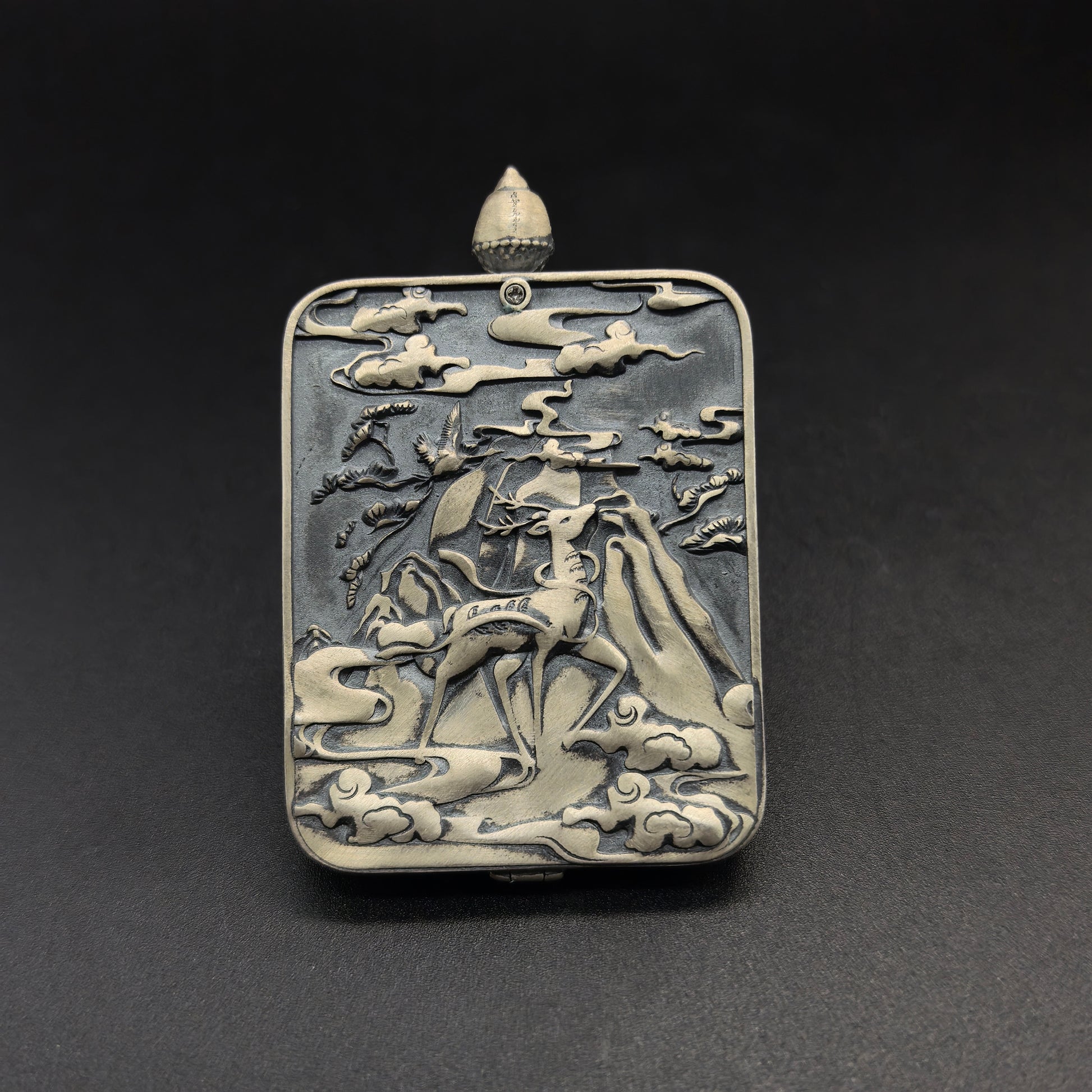 Detailed view of the 925 silver casing for the White Tara Thangka pendant, symbolising longevity and tradition in Buddhist practice.
