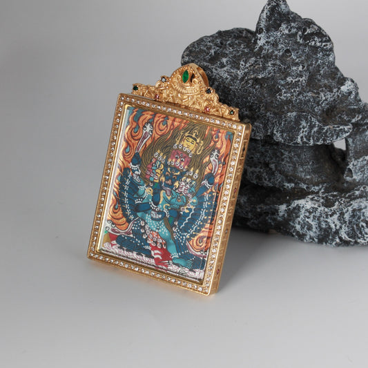 Hand-painted Nepal Yamantaka (Vajrabhairava) Thangka pendant featuring the Conqueror of Death, encased in titanium steel, representing protection and wisdom in Tibetan Buddhist tradition.
