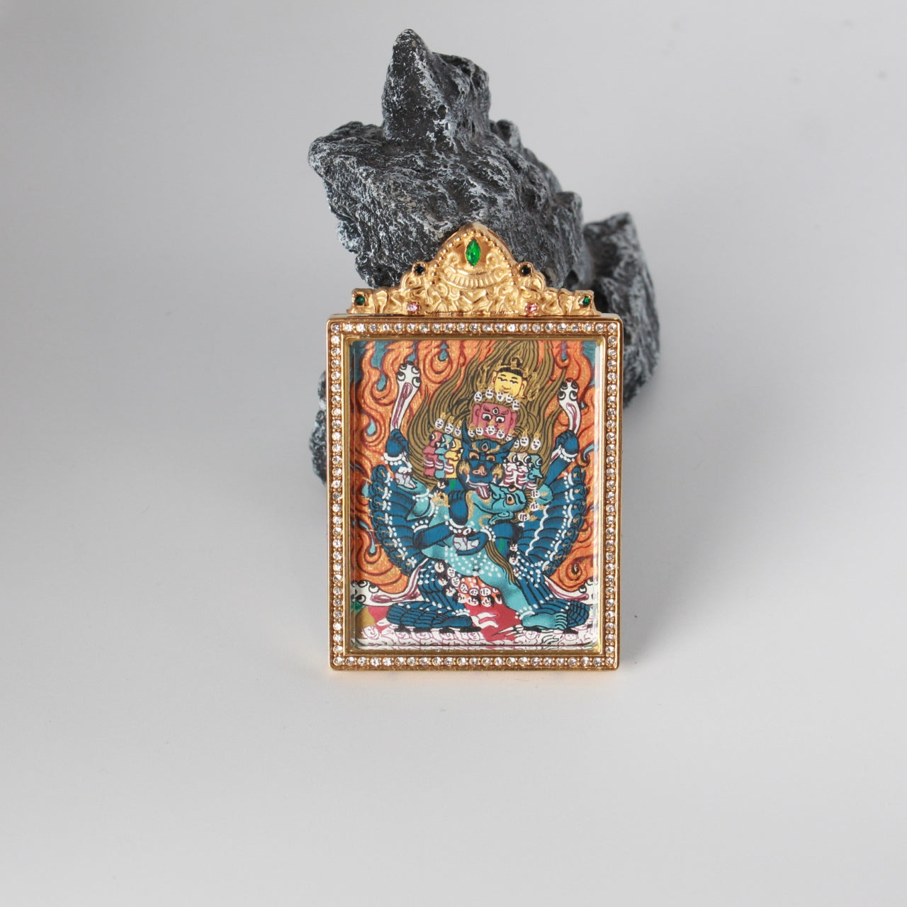 Close-up detail of the Nepal Yamantaka Thangka painting showing intricate natural mineral pigment work, showcasing the masterful artistry of Nepali lineage painters.

