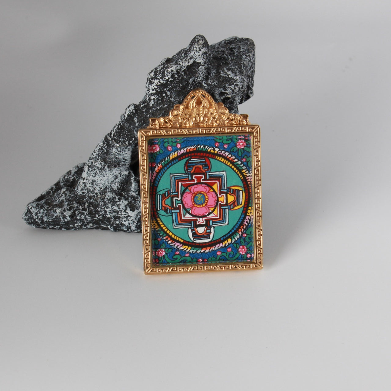  The Nepal Yamantaka Thangka pendant displayed as a sacred amulet for protection and wisdom, embodying Tibetan Buddhist tradition.

