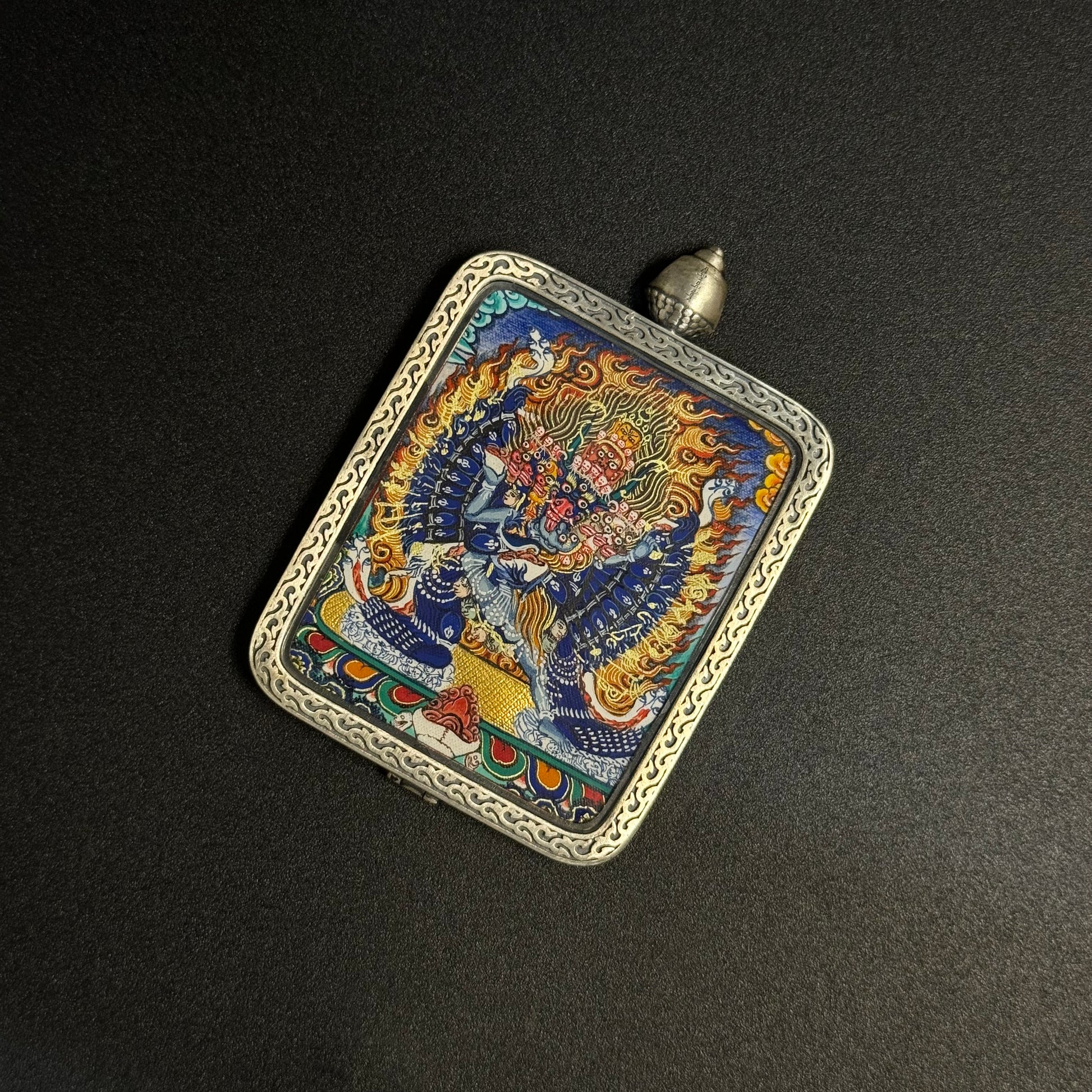  A 3.5x4.5cm hand-painted Rekong Cuiying series Yamantaka (Conqueror of Death) Thangka pendant featuring destruction of death and obstacles in Buddhist tradition.

