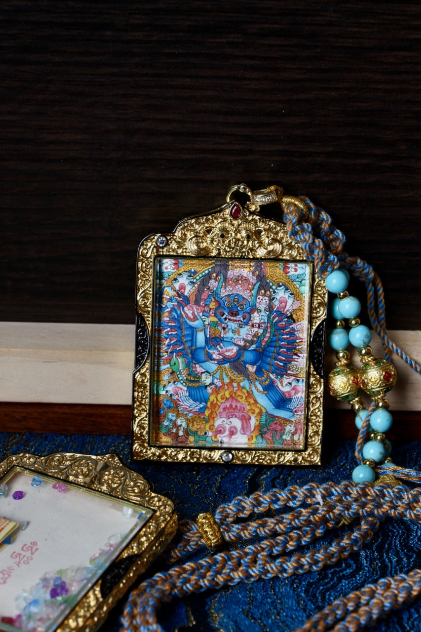 Vajrabhairava Yamantaka thangka pendant inspired by traditional Tibetan Buddhist art and sacred iconography.