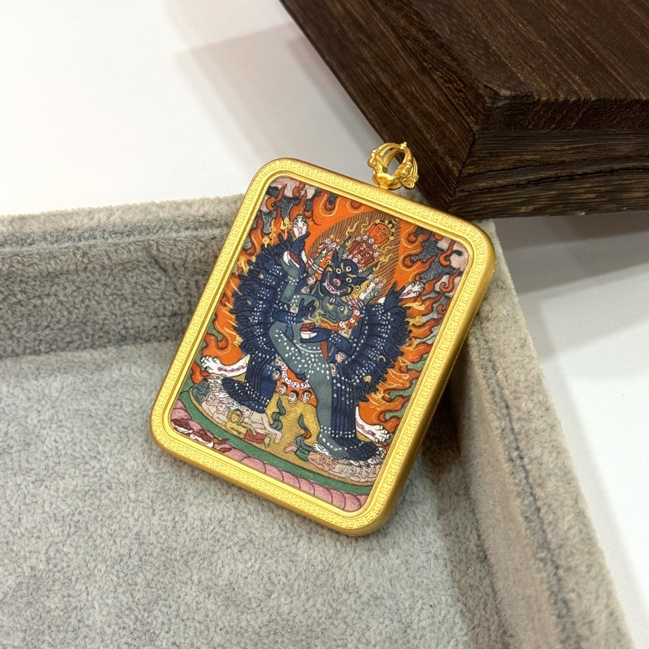  The Tibet Yamantaka Thangka pendant displayed as a sacred amulet for protection and wisdom, embodying Tibetan Buddhist tradition.

