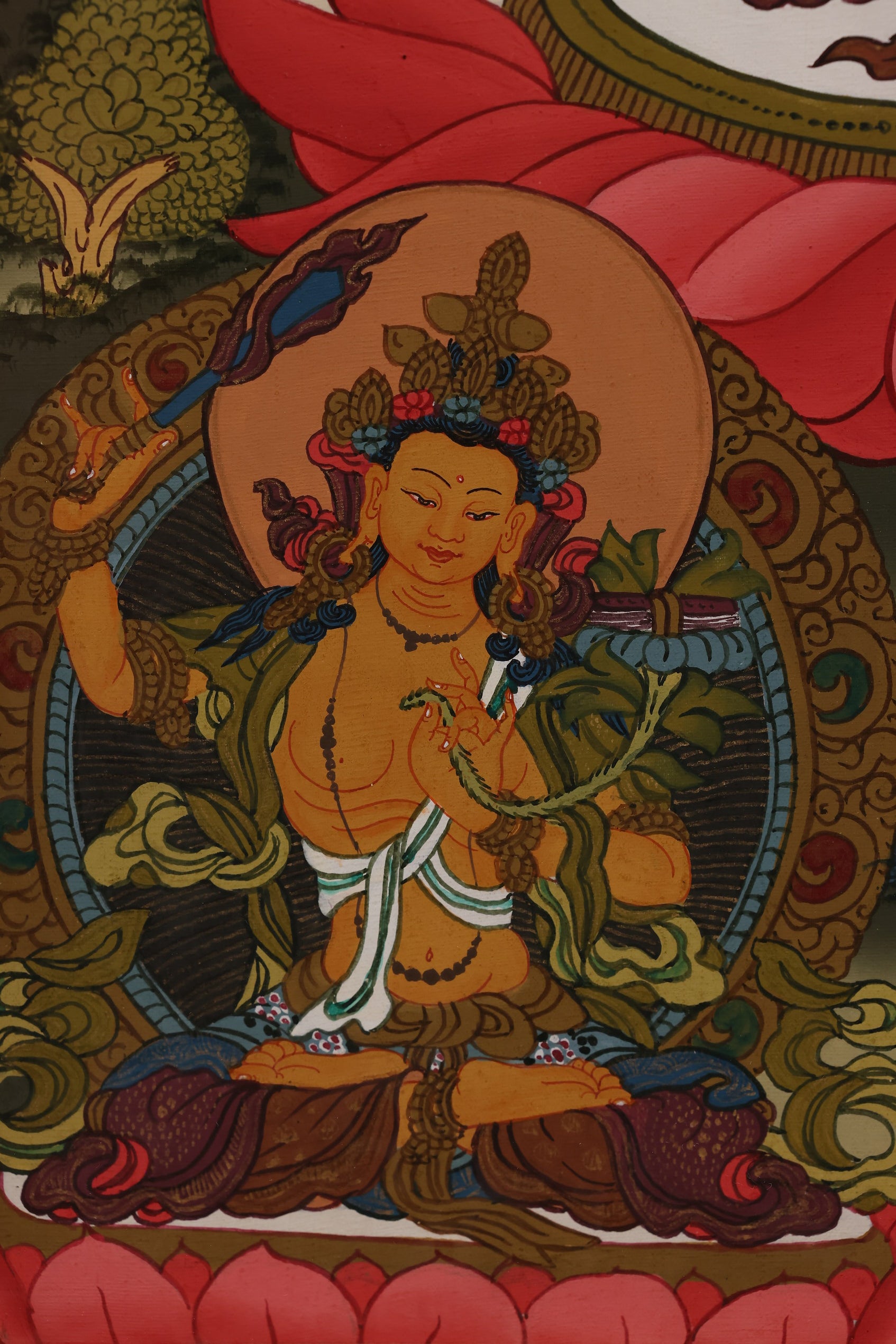 Traditional Tibetan Yellow Jambhala thangka representing wealth blessings and compassionate abundance