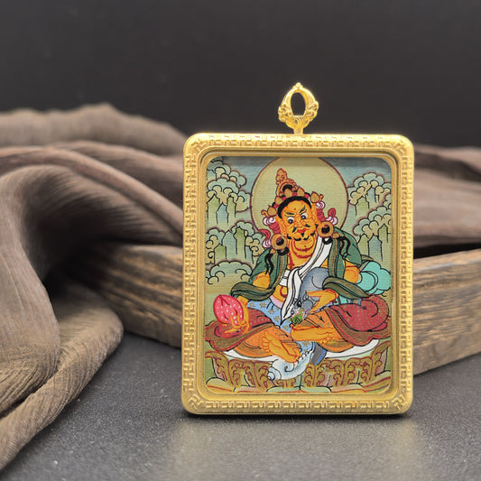  Detailed view of the titanium casing for the Yellow Jambhala Thangka pendant, symbolising wealth and tradition in Buddhist practice.

