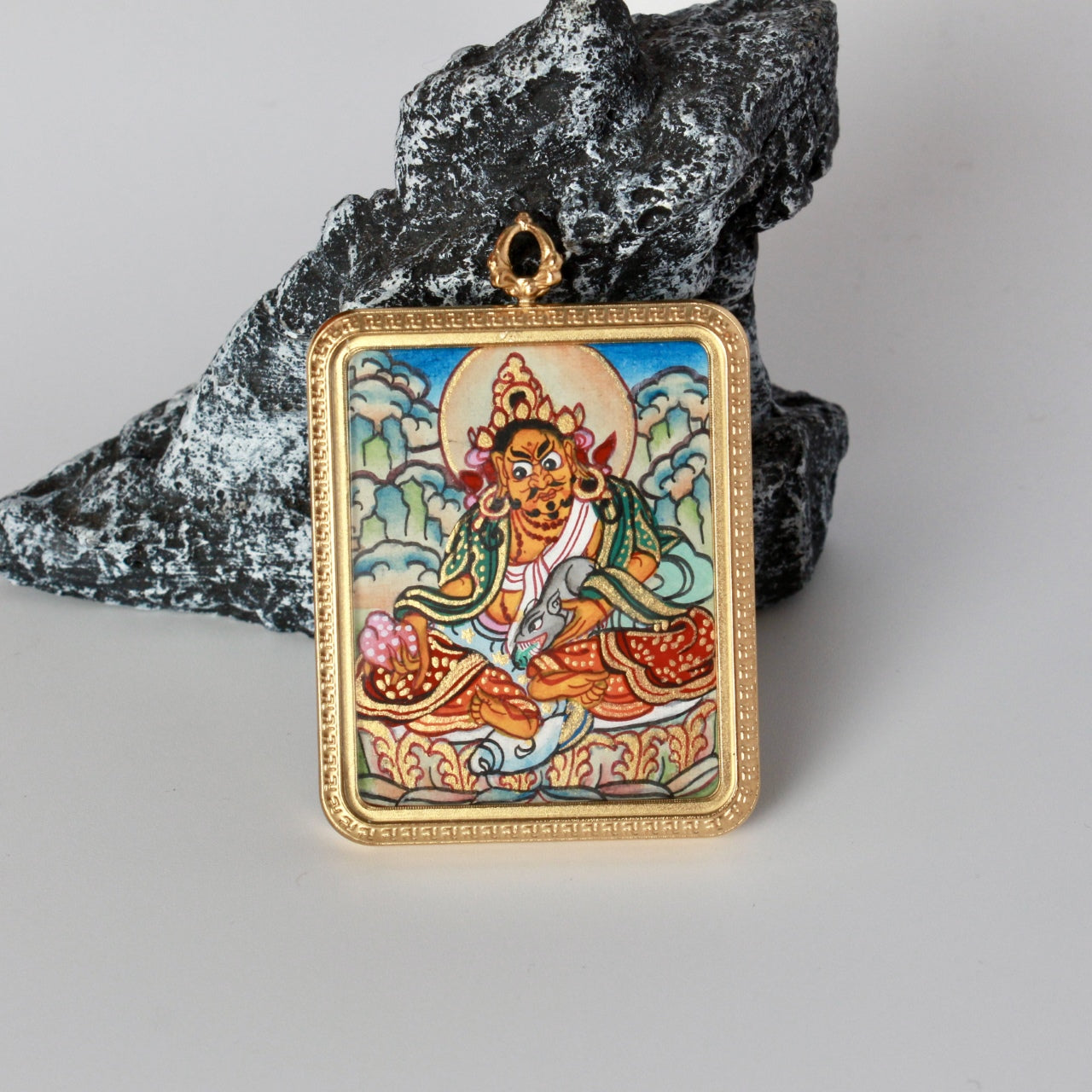 Close-up detail of the Nepal Elegant Gadri Yellow Jambhala Thangka painting showing intricate natural mineral pigment work, showcasing the masterful artistry of Nepali lineage painters.
