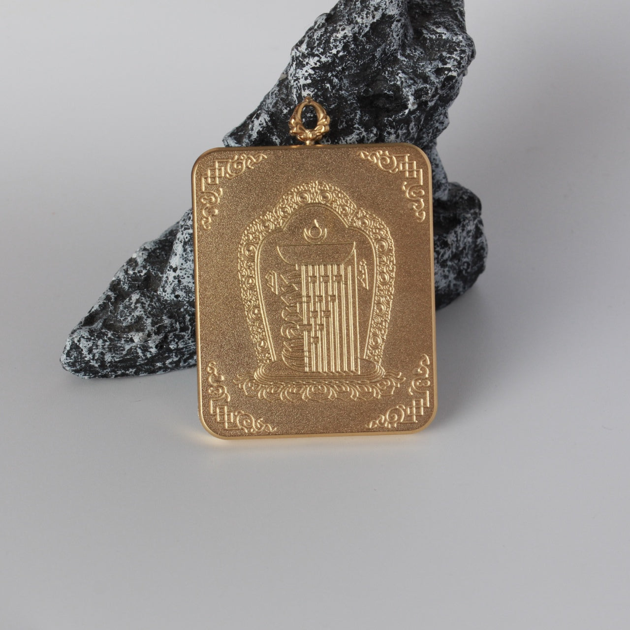  The Nepal Elegant Gadri Yellow Jambhala Thangka pendant displayed as a sacred amulet for wealth and prosperity, embodying Tibetan Buddhist tradition.
