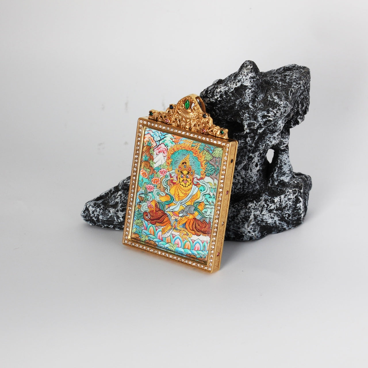  The Nepal Premium Yellow Jambhala Thangka pendant displayed as a sacred amulet for wealth and prosperity, embodying Tibetan Buddhist tradition.

