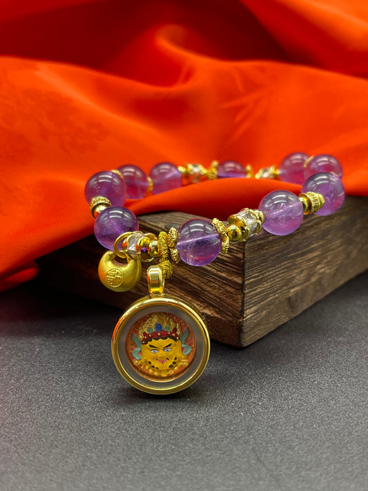  Hand-painted Yellow Jambhala (黄财神) Painted Tsa-Tsa with amethyst bracelet featuring the chief of wealth deities, representing the bestowal of prosperity in Buddhist tradition.

