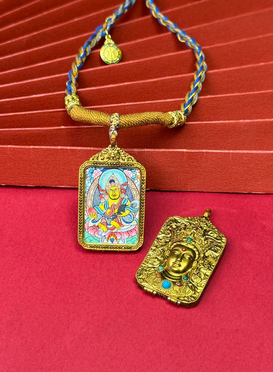 Hand-painted Rekong Yellow Jambhala (黄财神) Thangka pendant 2.5x3.5cm with copper casing featuring the king of wealth deities, representing prosperity in Buddhist tradition.
