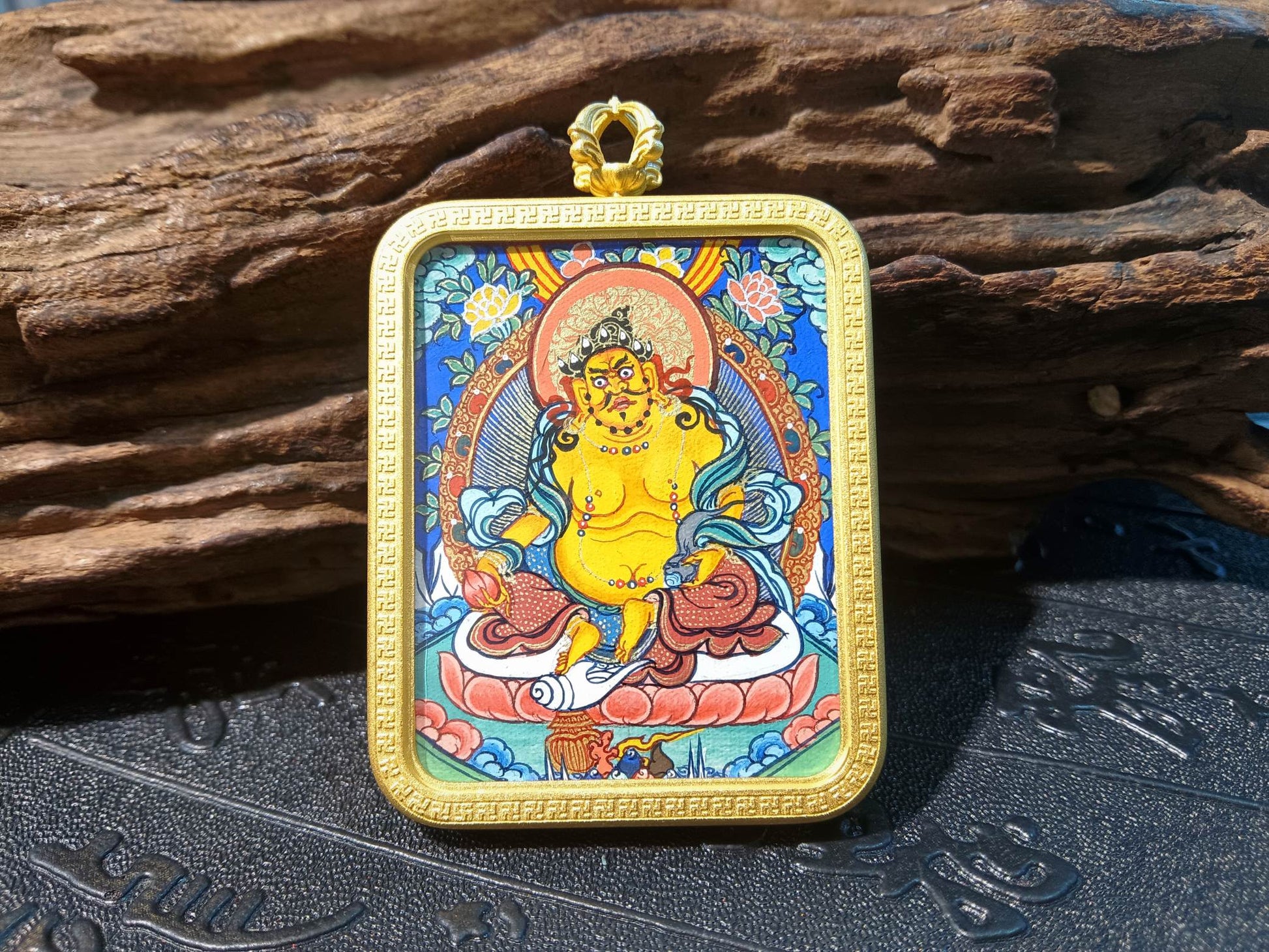  Close-up detail of the Rekong Yellow Jambhala Thangka showing mineral pigments, Rekong series artistry.

