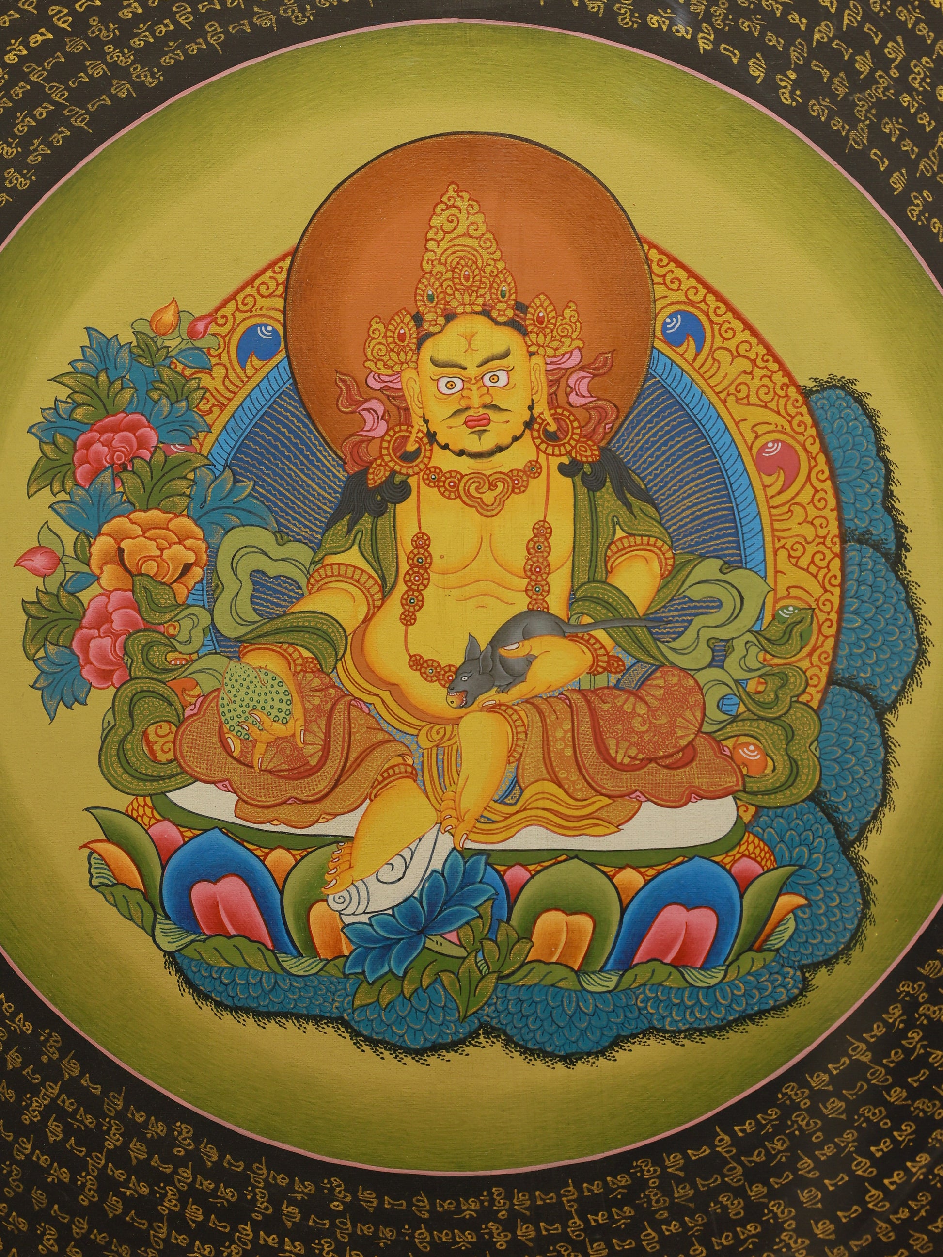 Exquisite Tibetan Buddhist Yellow Jambhala Thangka with Six Syllable Mantra, invoking wealth and spiritual blessings.
