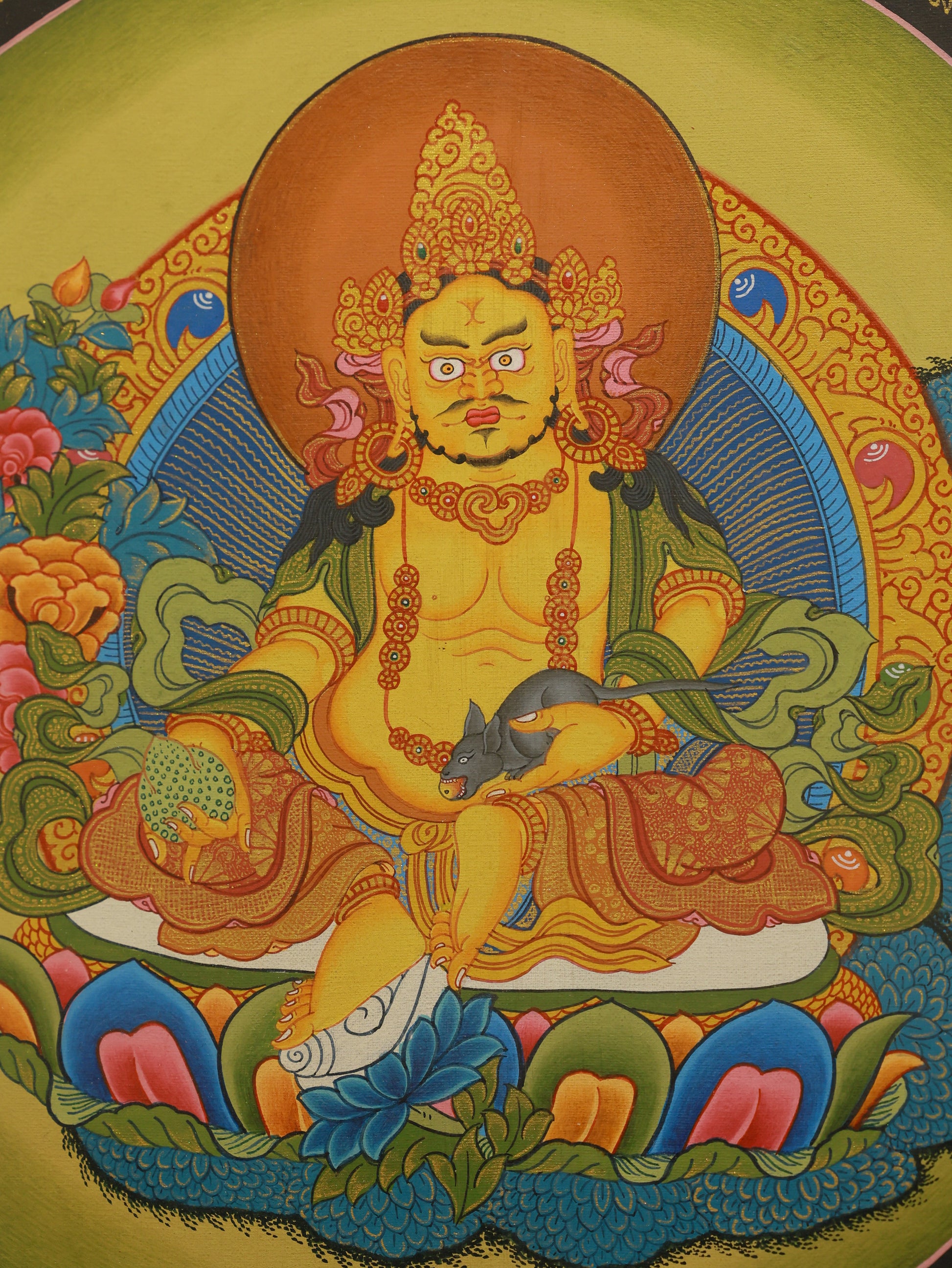 Sacred Yellow Jambhala Thangka in Tibetan Buddhist style, featuring the Six Syllable Mantra for financial and spiritual prosperity.