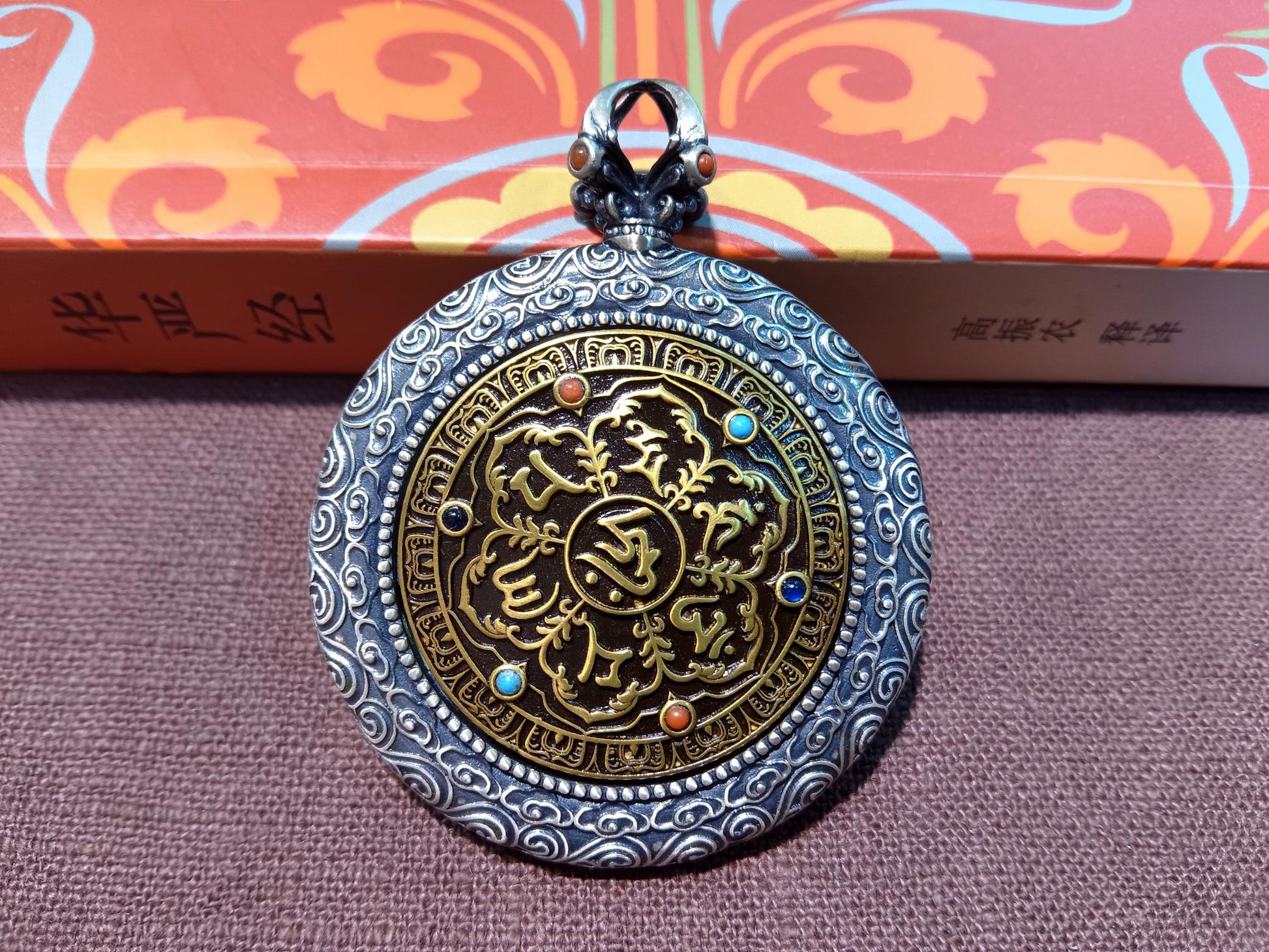  Close-up detail of the Tibet Card Yellow Jambhala Thangka showing gold cinnabar orpiment lapis, Tibet Card series artistry.

