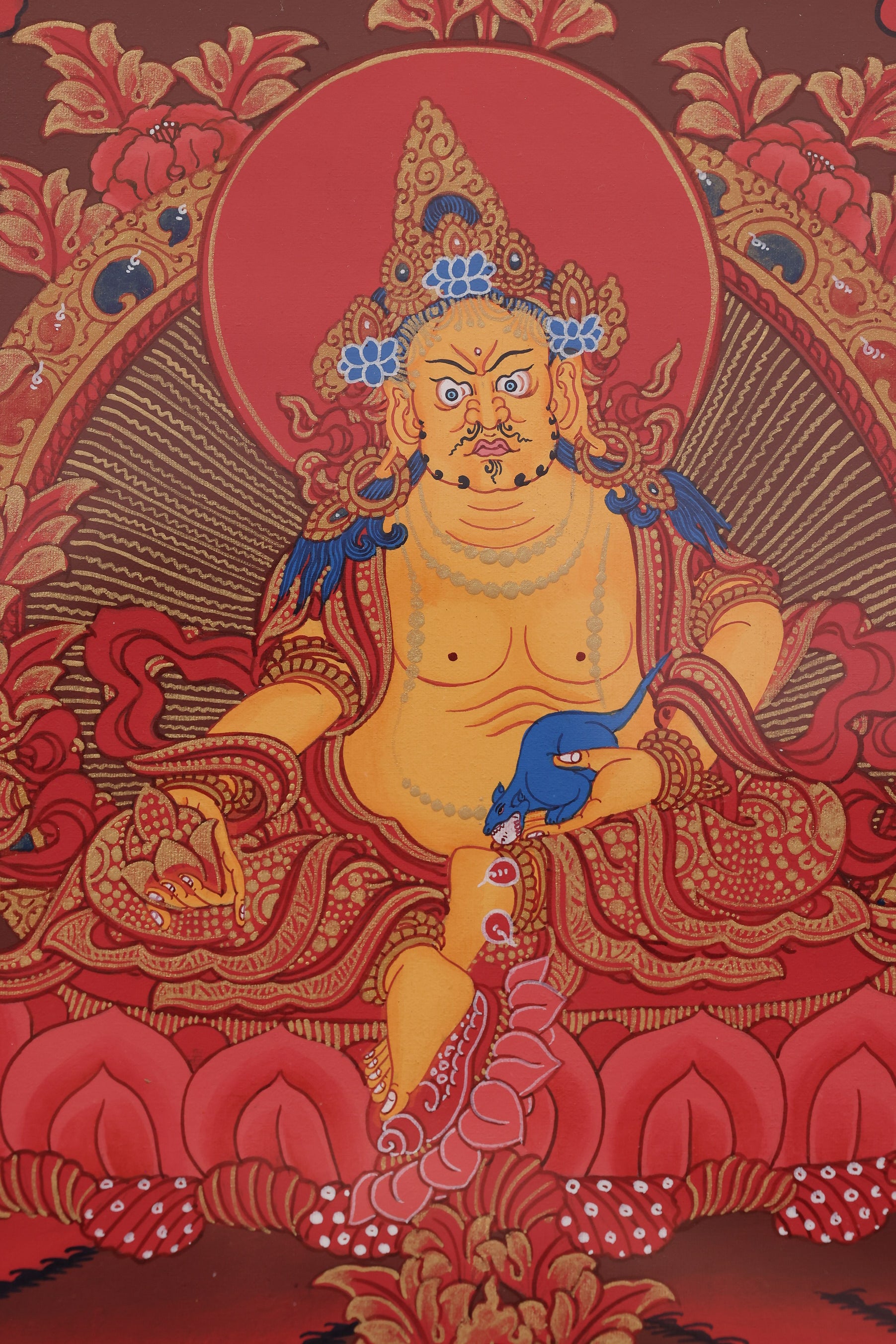Yellow Jambhala Thangka symbolizing riches, good fortune, and spiritual blessings