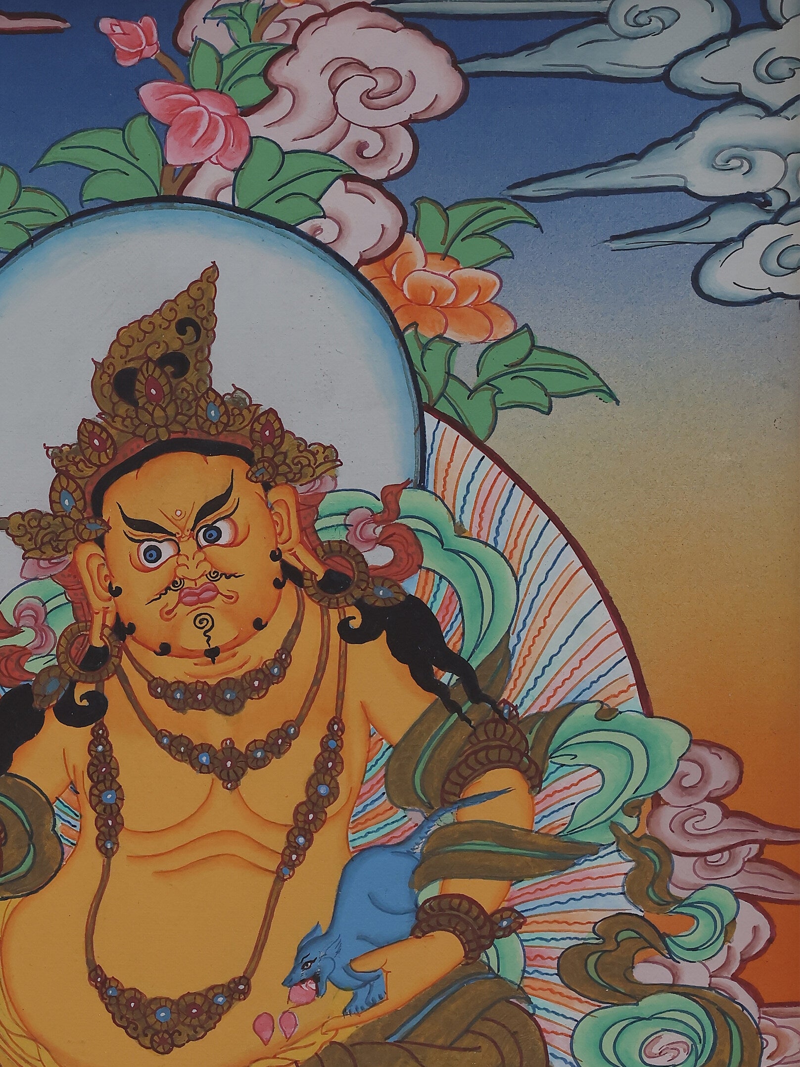 Tantric Tibetan thangka artwork of Yellow Jambhala, the powerful wealth deity in Vajrayana Buddhism.