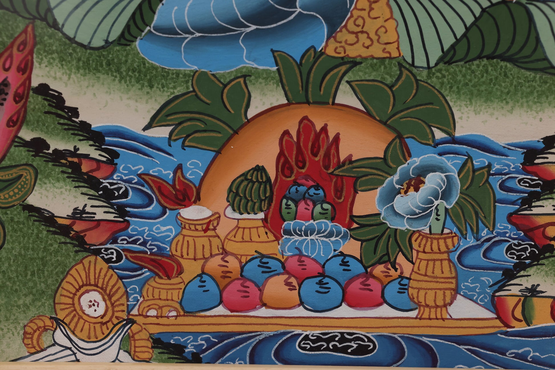 Yellow Jambhala holding vajra and bell, representing spiritual authority and prosperity.