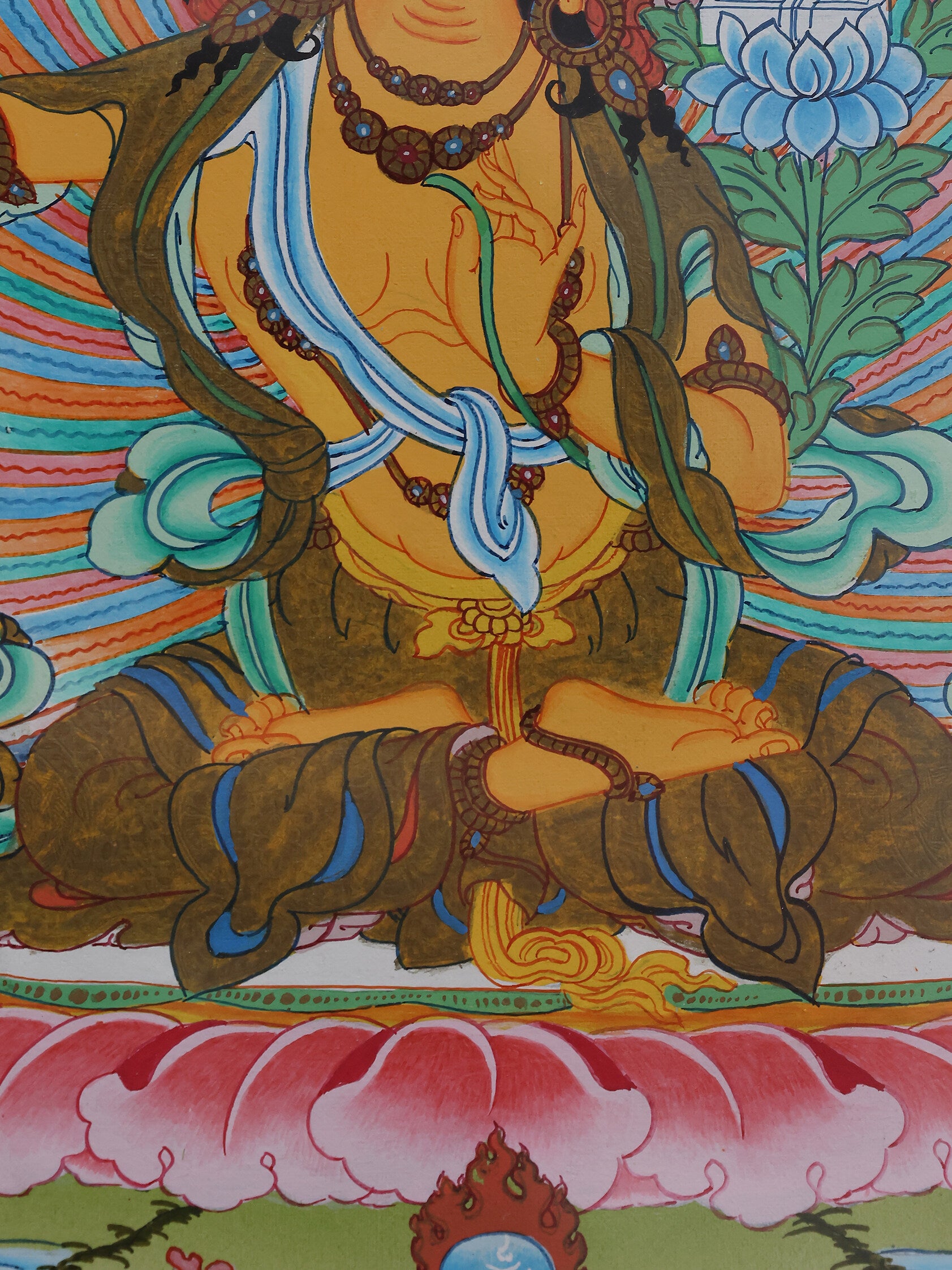 Tibetan Buddhist Manjushri thangka seated on a lotus throne symbolizing pure enlightened wisdom