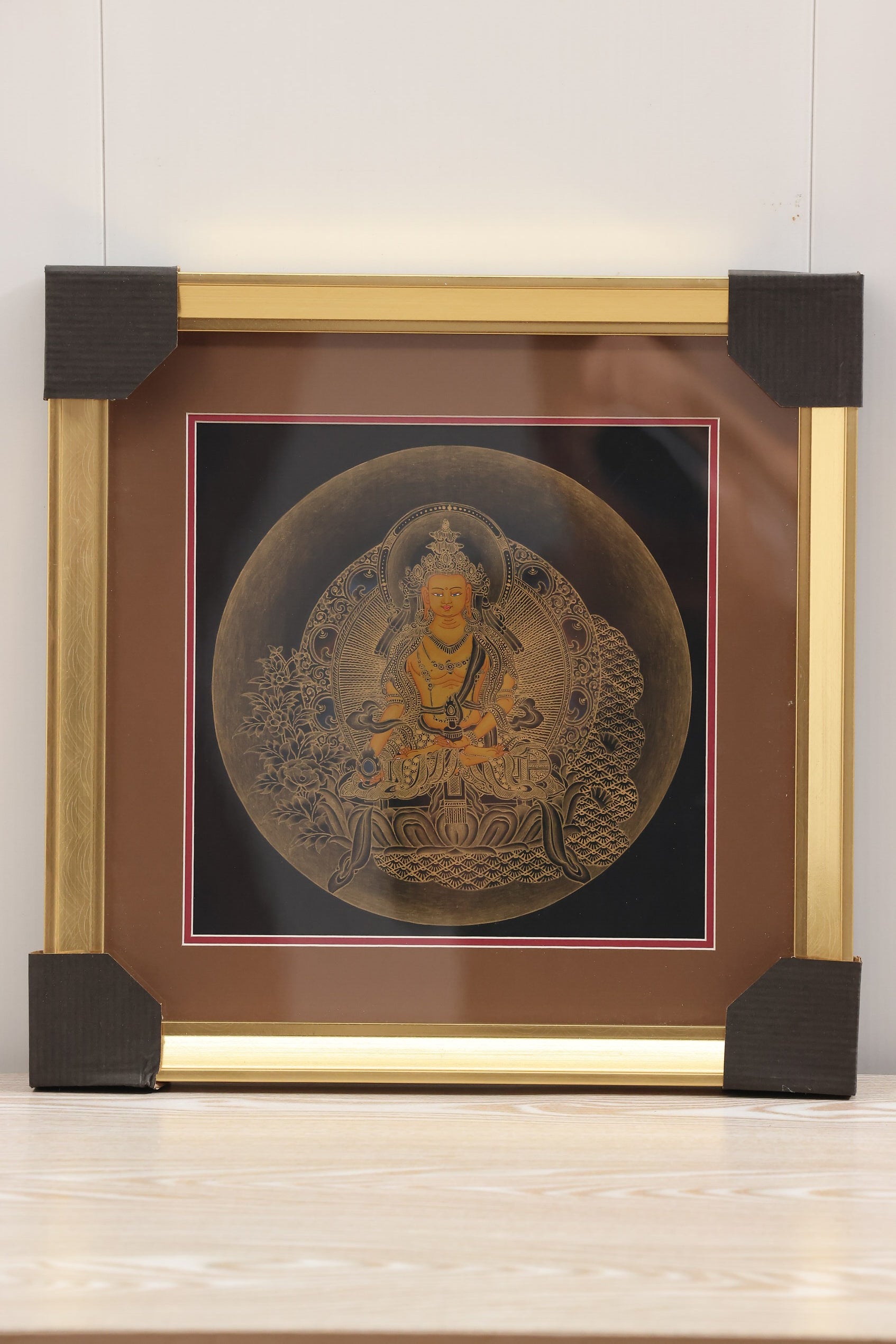 Yellow Manjushri Bodhisattva wields the sword of wisdom, cutting through afflictive and cognitive obscurations. The Thangka features exquisite details and rich colors.