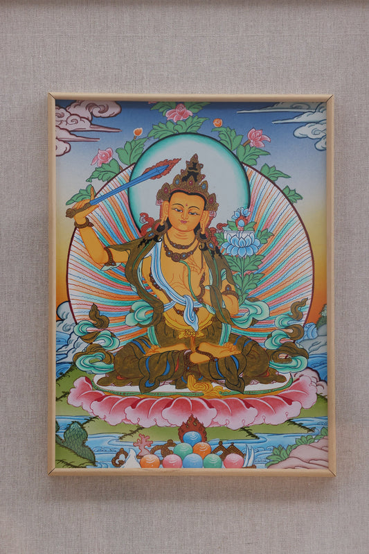 Traditional Tibetan Buddhist Manjushri thangka art showing the sword of wisdom cutting through ignorance
