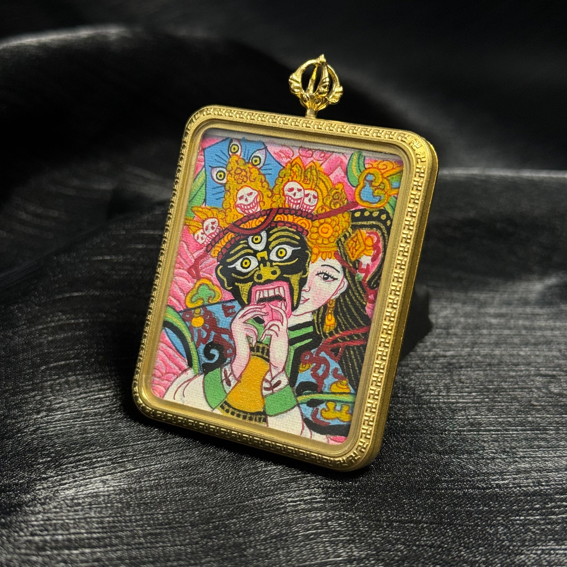  Detailed view of the protective casing for the Pink Zaki Lhamo Nepal Thangka pendant.
