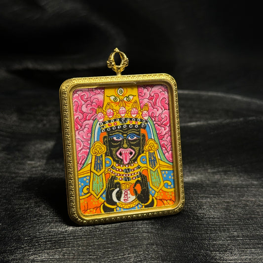  A 4x5cm hand-painted Nepal Pink Zaki Lhamo Thangka pendant featuring the female wealth deity in a pink palette, representing wealth and blessing in Buddhist tradition.
