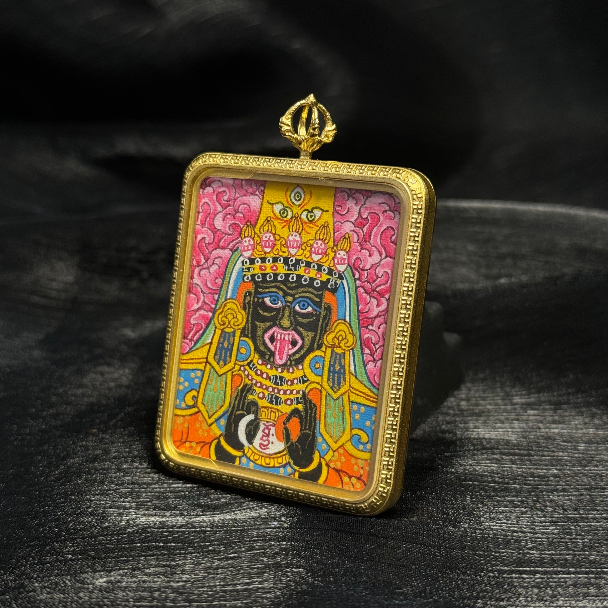  Detailed view of the protective casing for the Pink Zaki Lhamo Nepal Thangka pendant.
