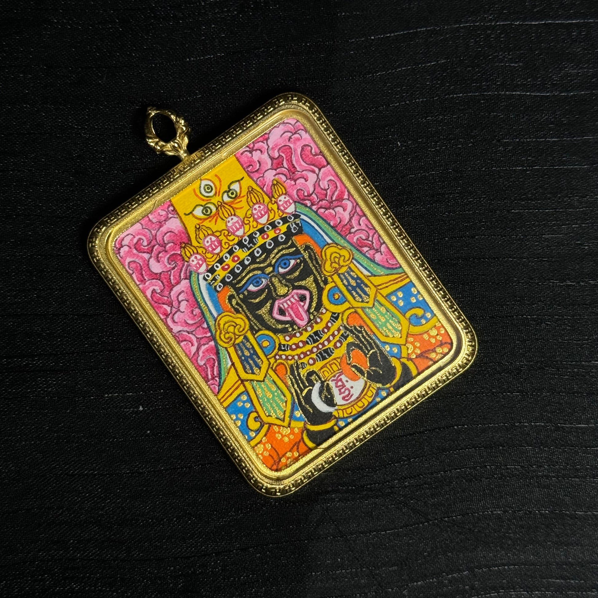  The Nepal Pink Zaki Lhamo Thangka pendant displayed as a sacred amulet for wealth and blessing.

