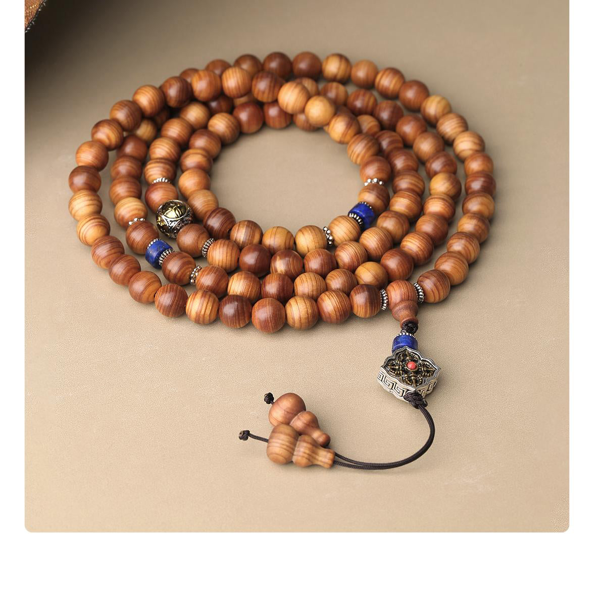 Cypress 108-bead mala promoting calm energy, prosperity, and spiritual grounding.